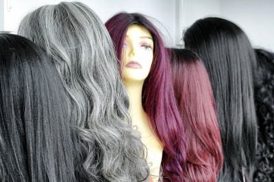 hair wigs display in a hair extension boutique
